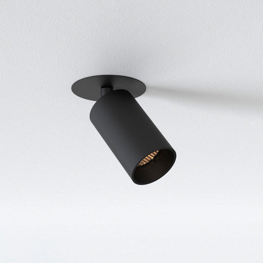 integrated led recessed spotlight with black finish and light turned on